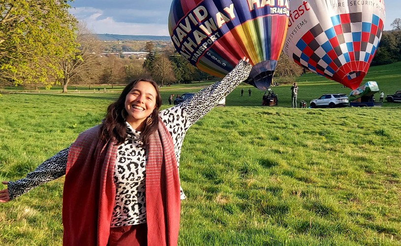 Bristol foodie Janine Alexander in front of hot air baloons